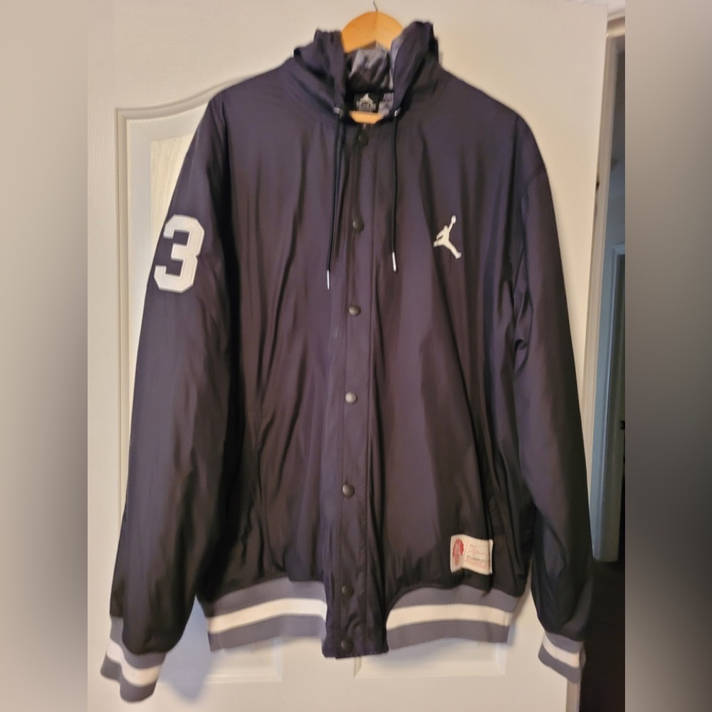 Black Jordan Bomber Jacket with 23 on the sleeve. Size xxl with hood.